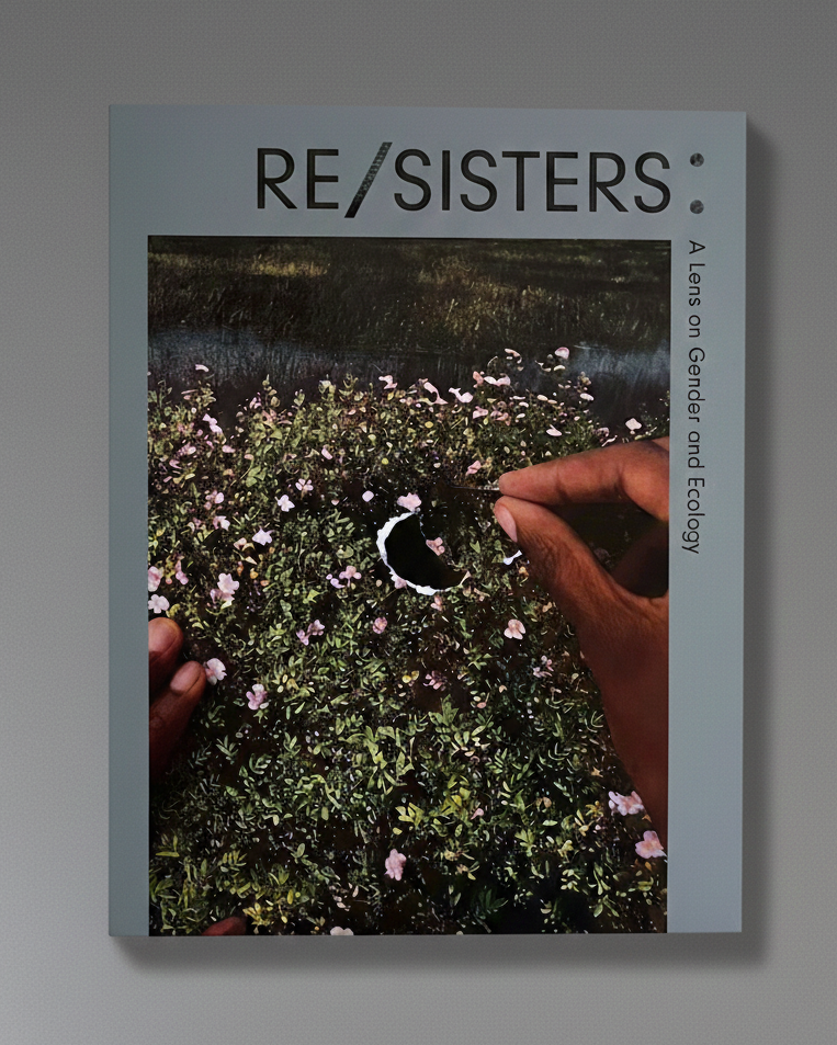 Book cover of 'RE/SISTERS' with a hand holding flowers on a gray background